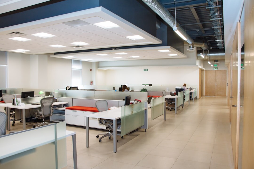 Bright open-plan magazine office with desks