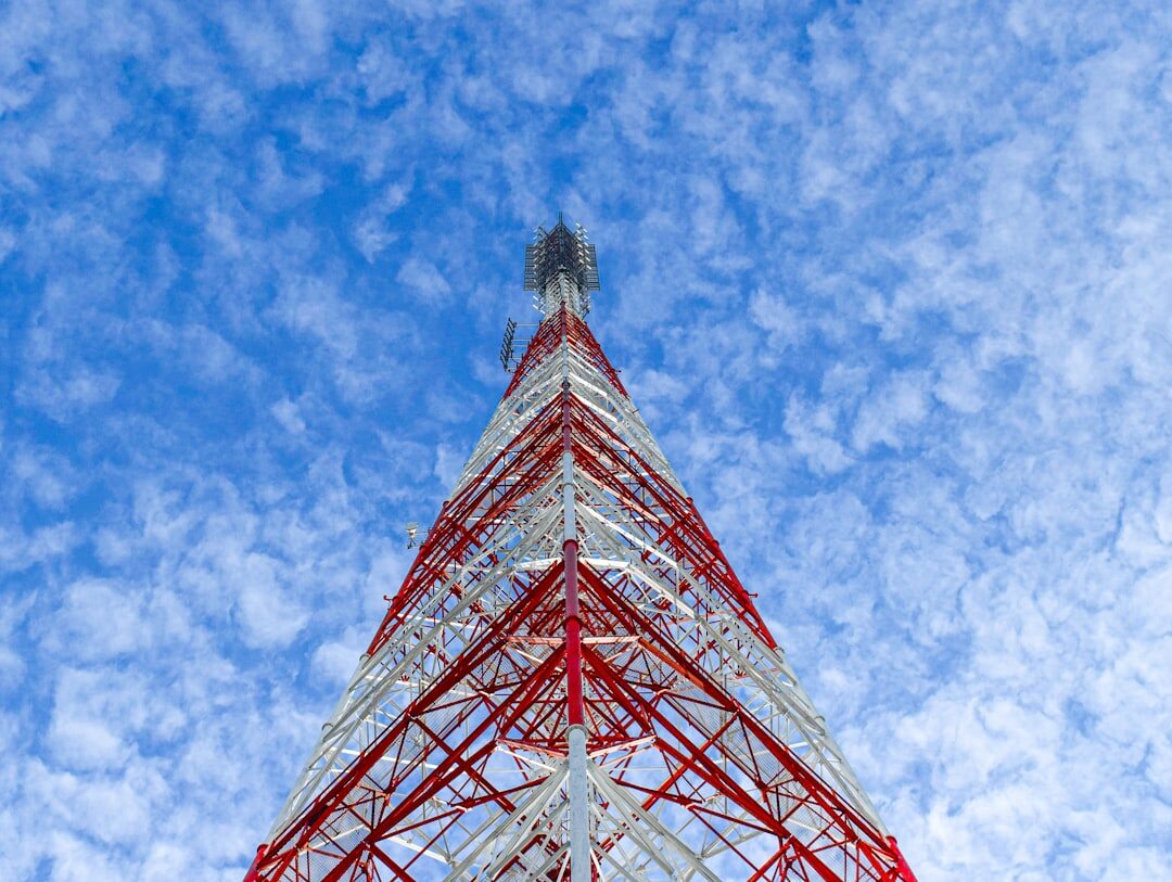 Television broadcast transmission tower against the sky